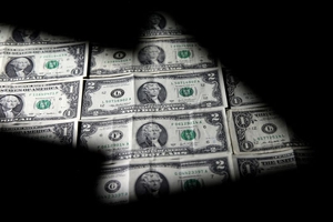 news image for Dollar edges lower; on track for second straight monthly loss